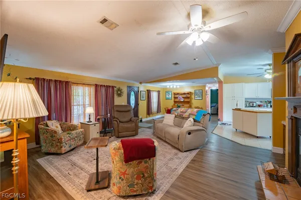 a kitchen with stainless steel appliances granite countertop a stove and a refrigerator