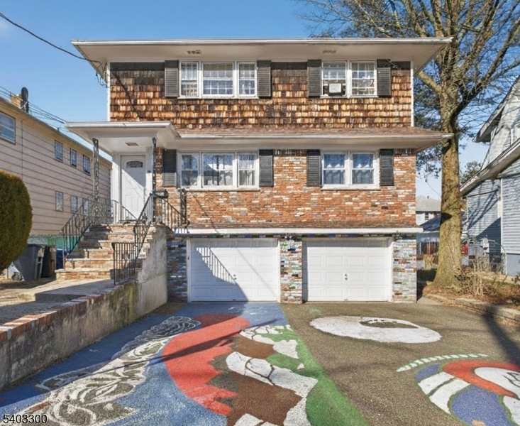 a front view of a house with entertaining space