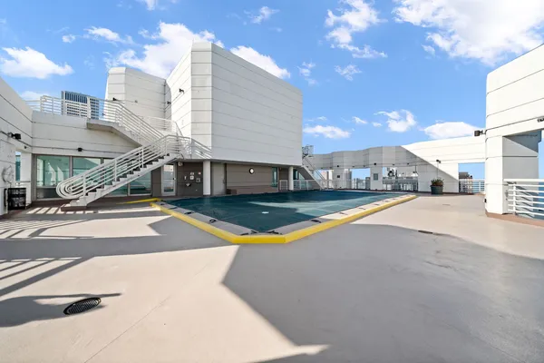 a view of a building with pool