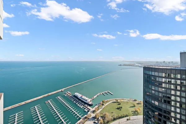 a view of a balcony with an ocean view