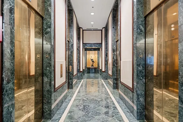 a view of a bathroom with a glass door
