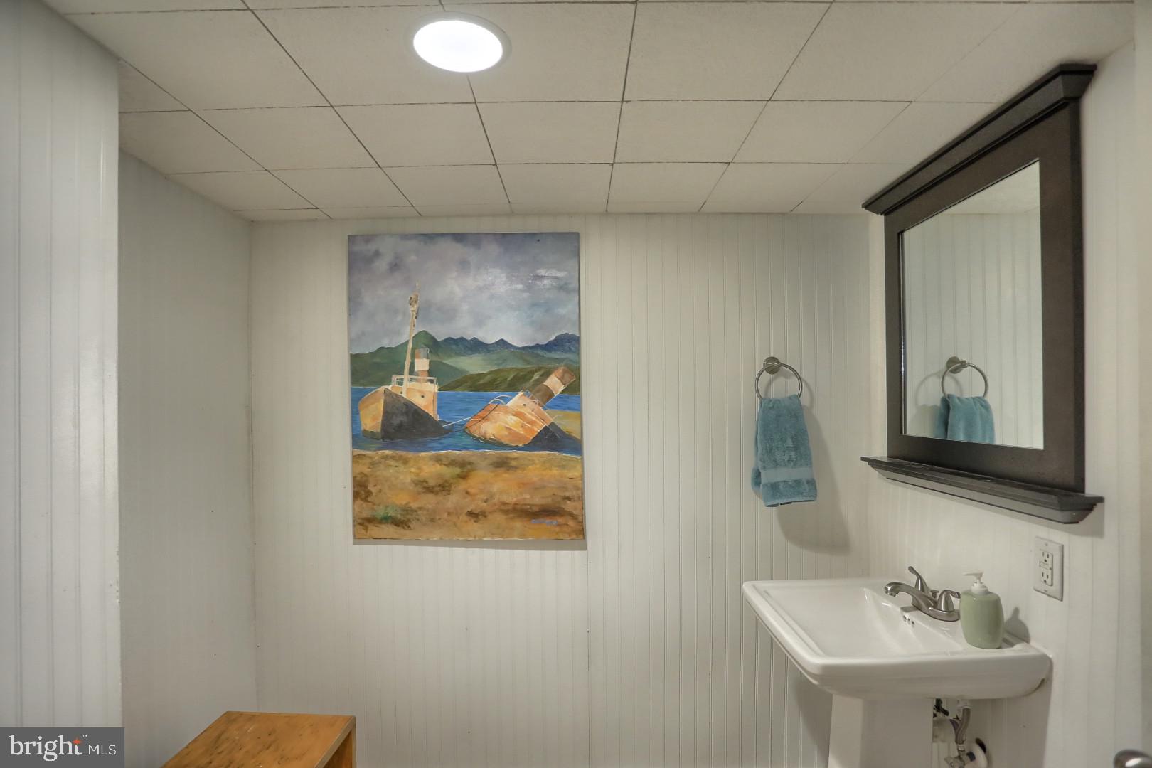 2345 River Road Reading, PA 19605 - Photo 11 of 28 a bathroom with a sink mirror and vanity