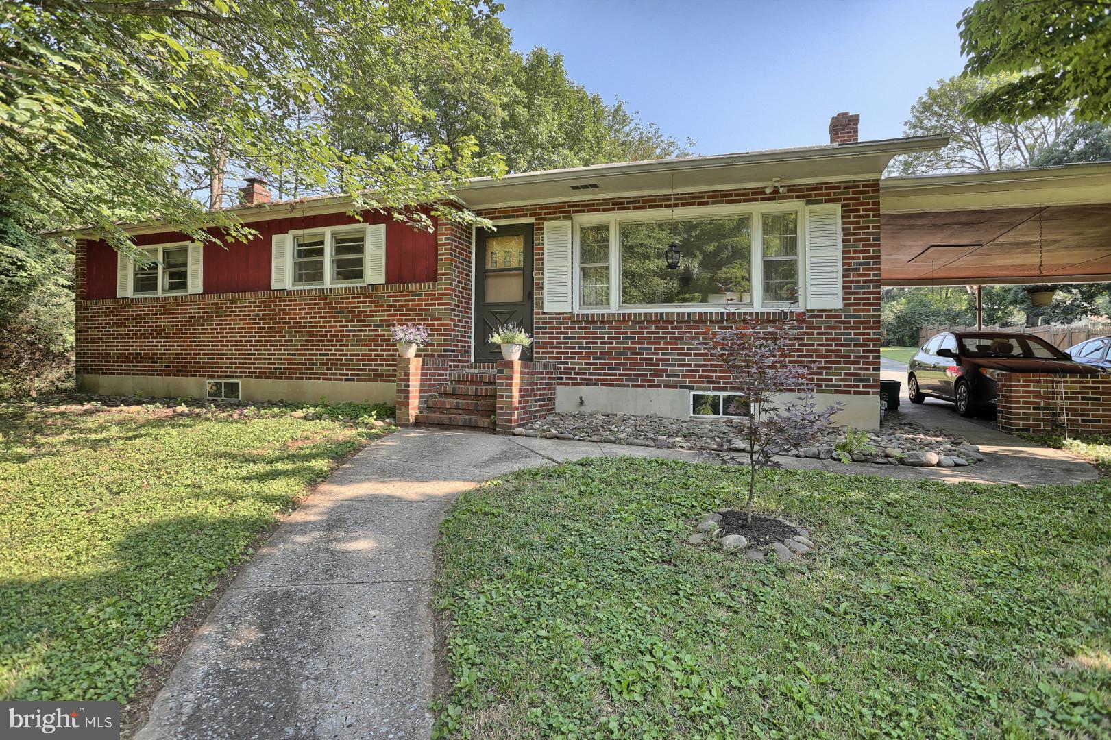 2345 River Road Reading, PA 19605 - Photo 22 of 28 a front view of a house with a porch