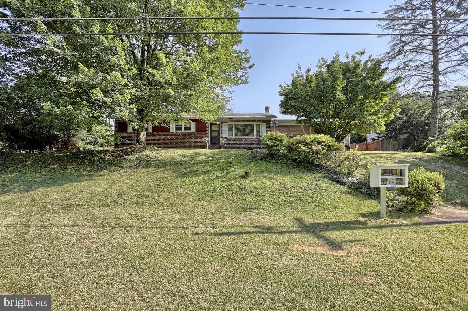 2345 River Road Reading, PA 19605 - Photo 24 of 28 a front view of a house with garden