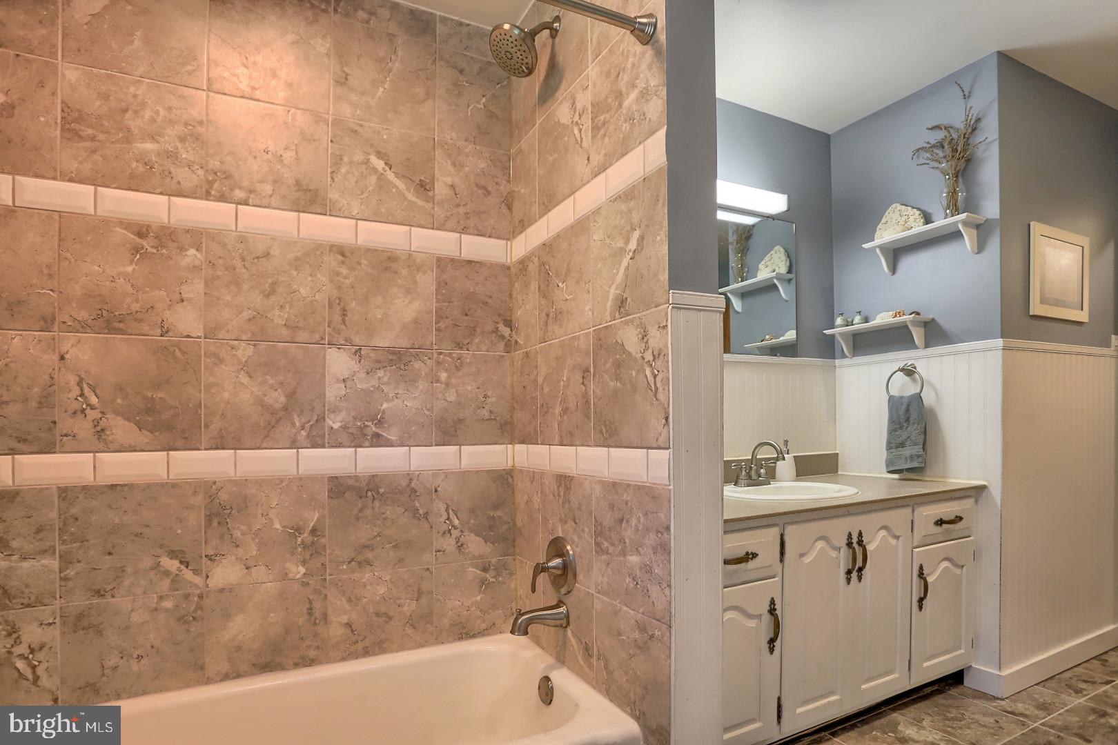 2345 River Road Reading, PA 19605 - Photo 8 of 28 a bathroom with a bathtub and a sink