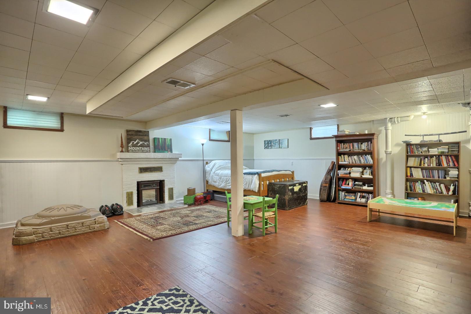 2345 River Road Reading, PA 19605 - Photo 9 of 28 a living room with furniture and a fireplace