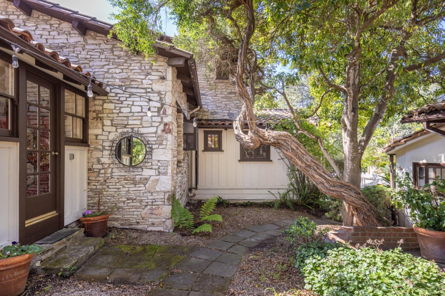25286 Hatton Road Carmel, CA 93923 - Photo 8 of 34 a white house that has tree in front of it