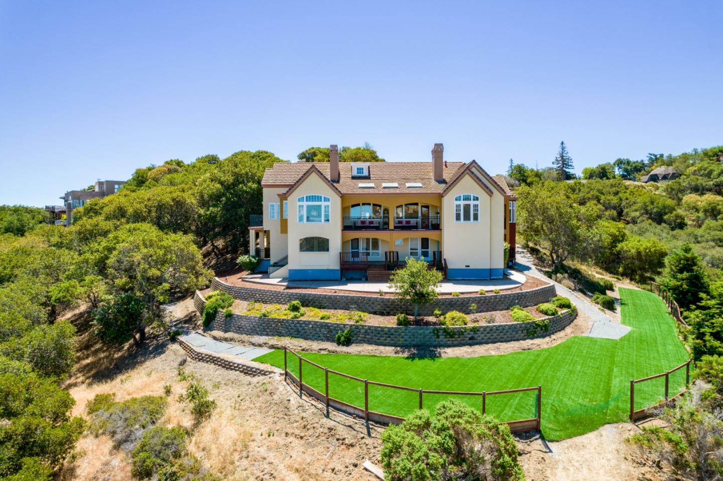 24 Shratton Avenue San Carlos, CA 94070 - Photo 2 of 13 a front view of a house with a yard