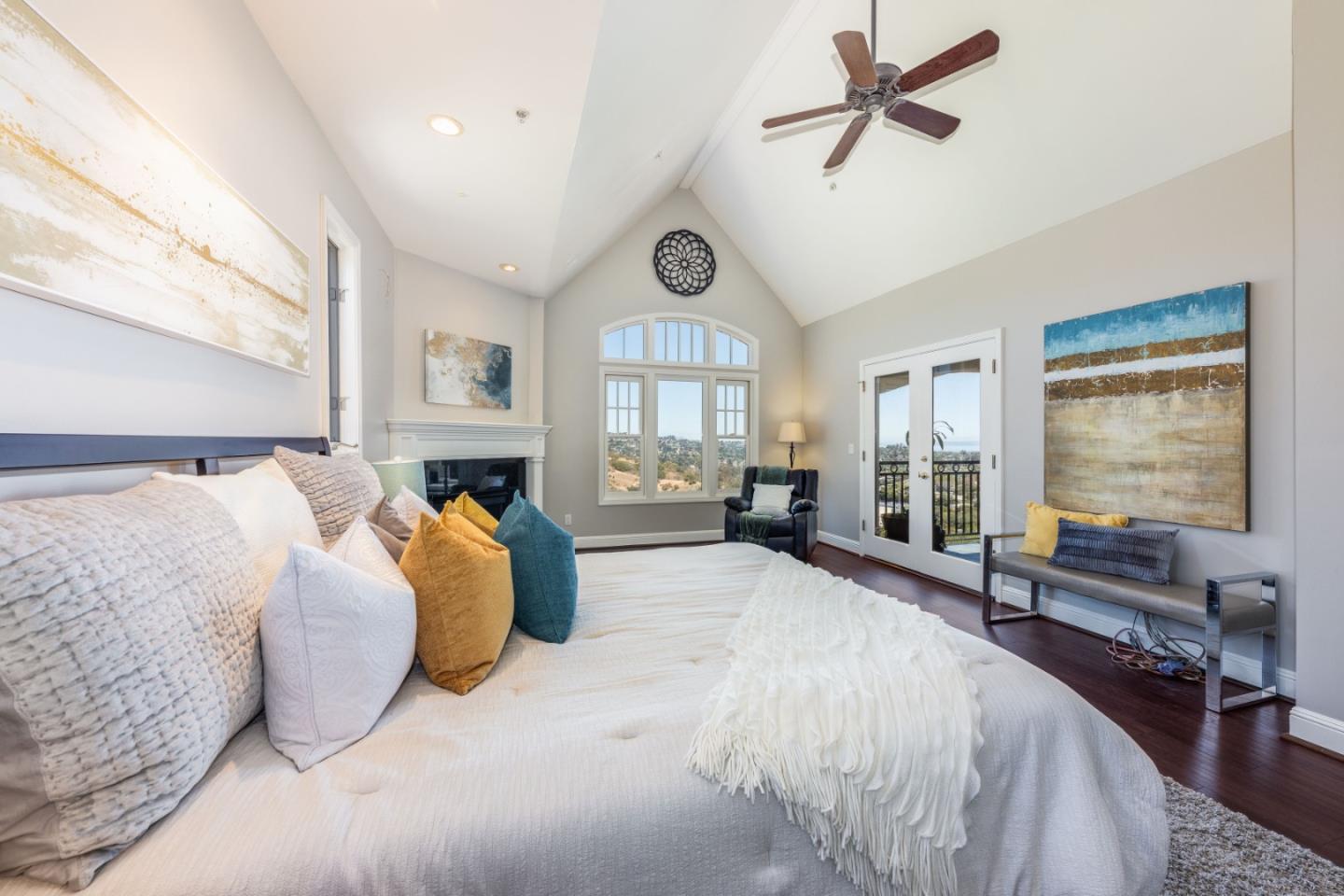 24 Shratton Avenue San Carlos, CA 94070 - Photo 8 of 13 a spacious bedroom with a bed couch and a large window