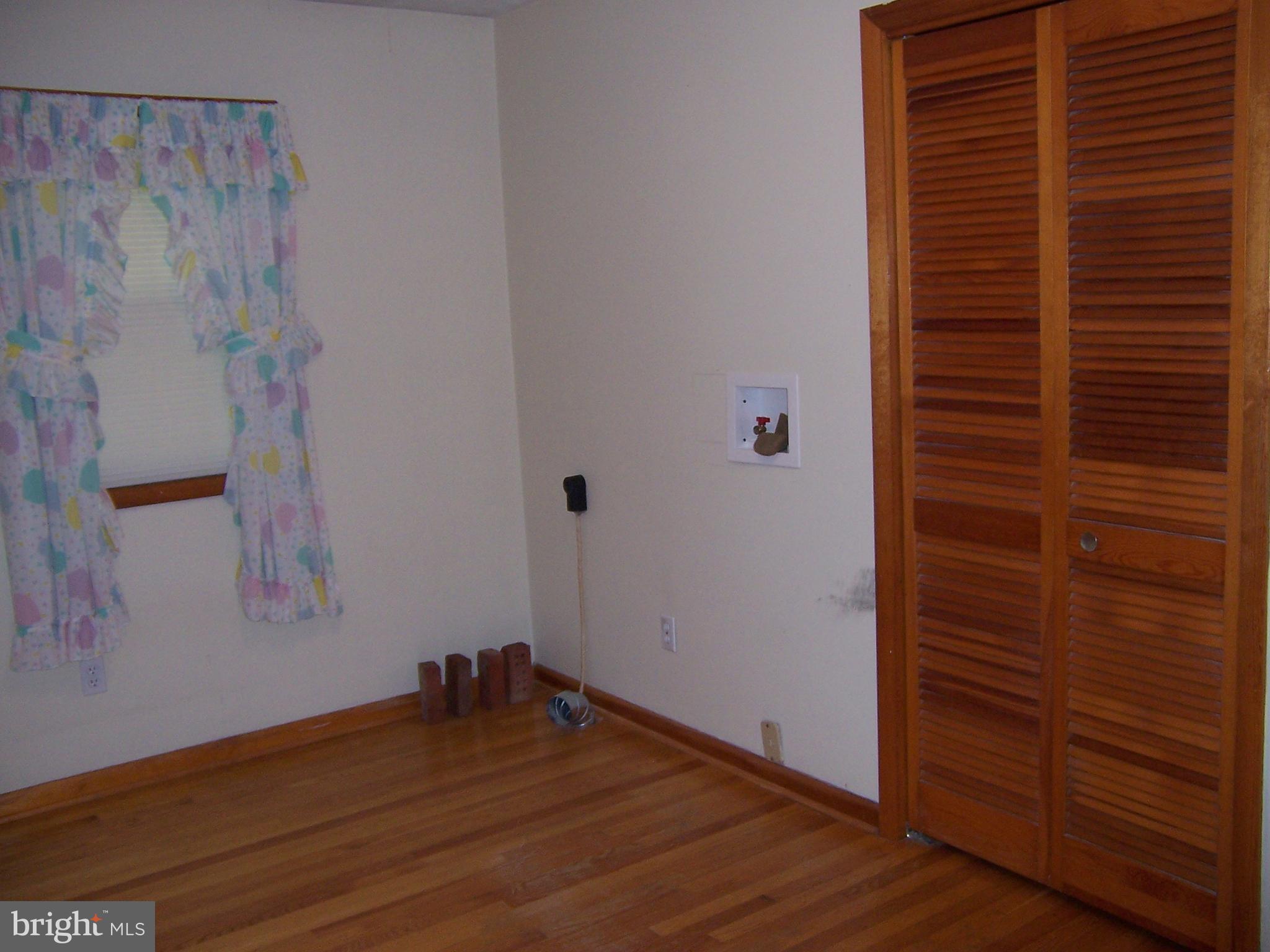 1390 Co Rte 51/9 Inwood, WV 25428 - Photo 17 of 22 Bedroom WITH LAUNDRY AREA 2 LAUNDRY'S