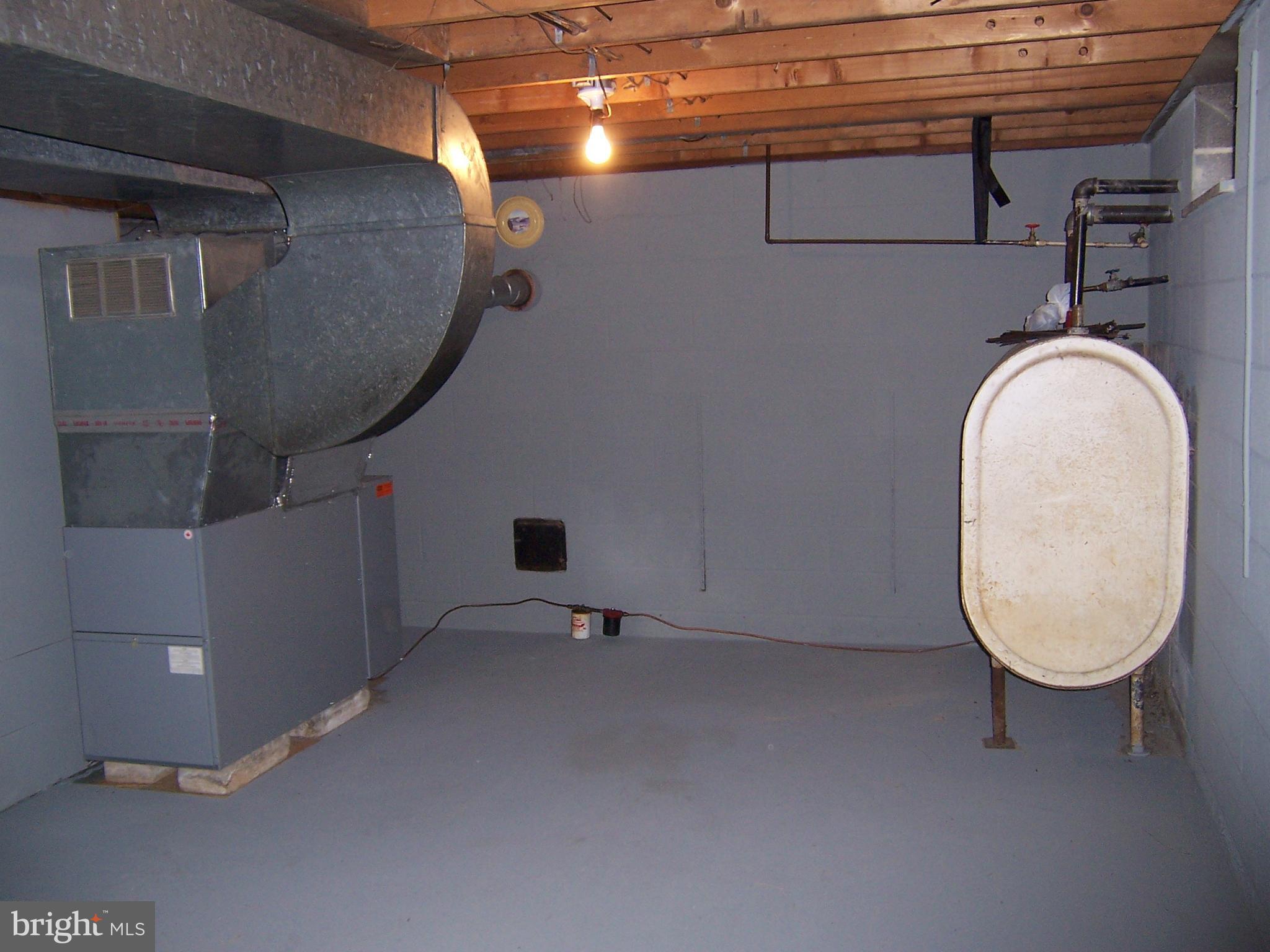 1390 Co Rte 51/9 Inwood, WV 25428 - Photo 21 of 22 basement furnace+oil tank