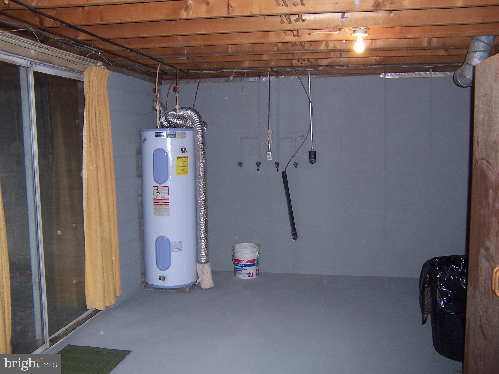 1390 Co Rte 51/9 Inwood, WV 25428 - Photo 22 of 22 basement walk out with extra doors- laundry