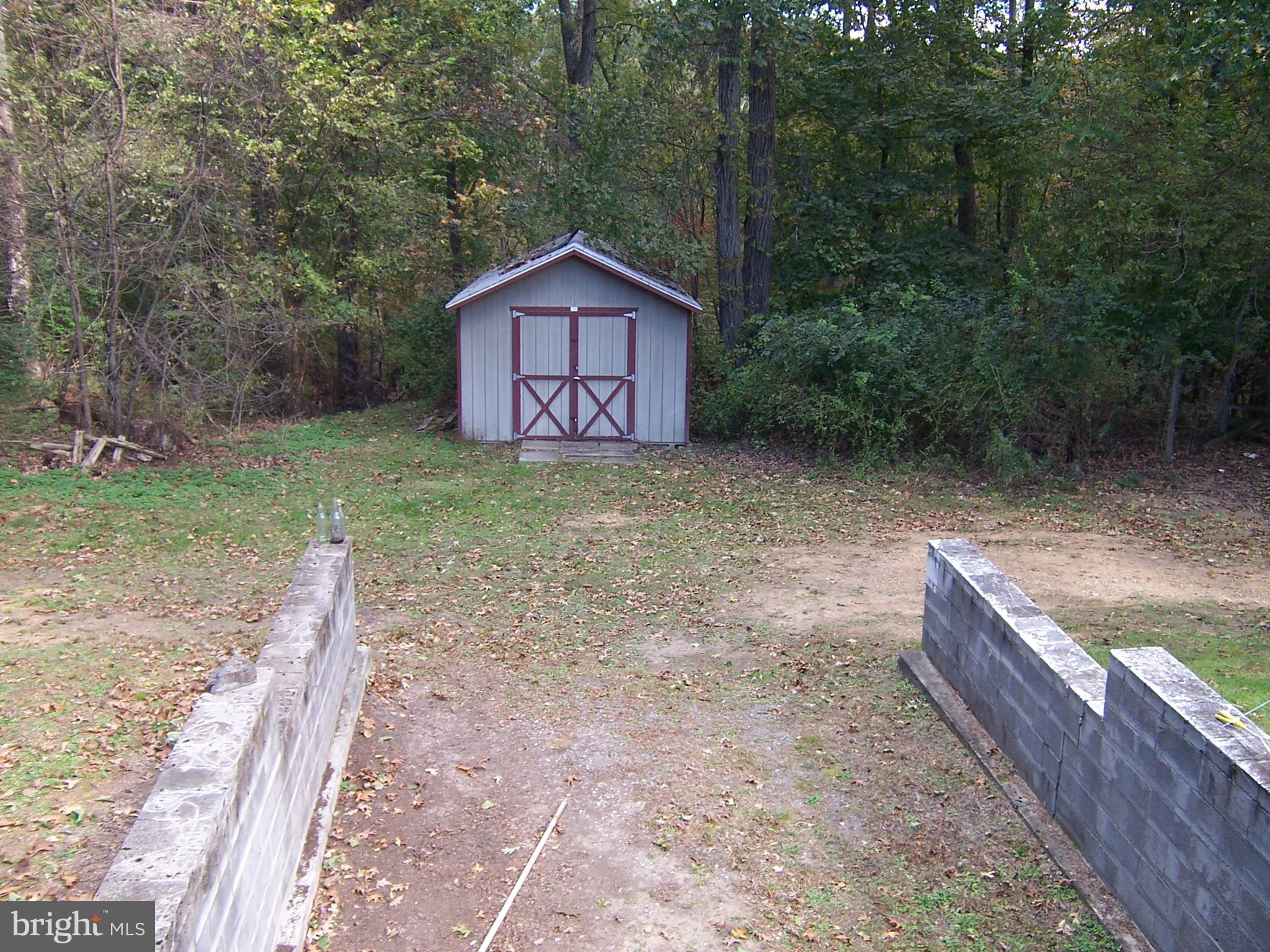 1390 Co Rte 51/9 Inwood, WV 25428 - Photo 8 of 22 FROM DECK TO BACK AN 12X20 SHED