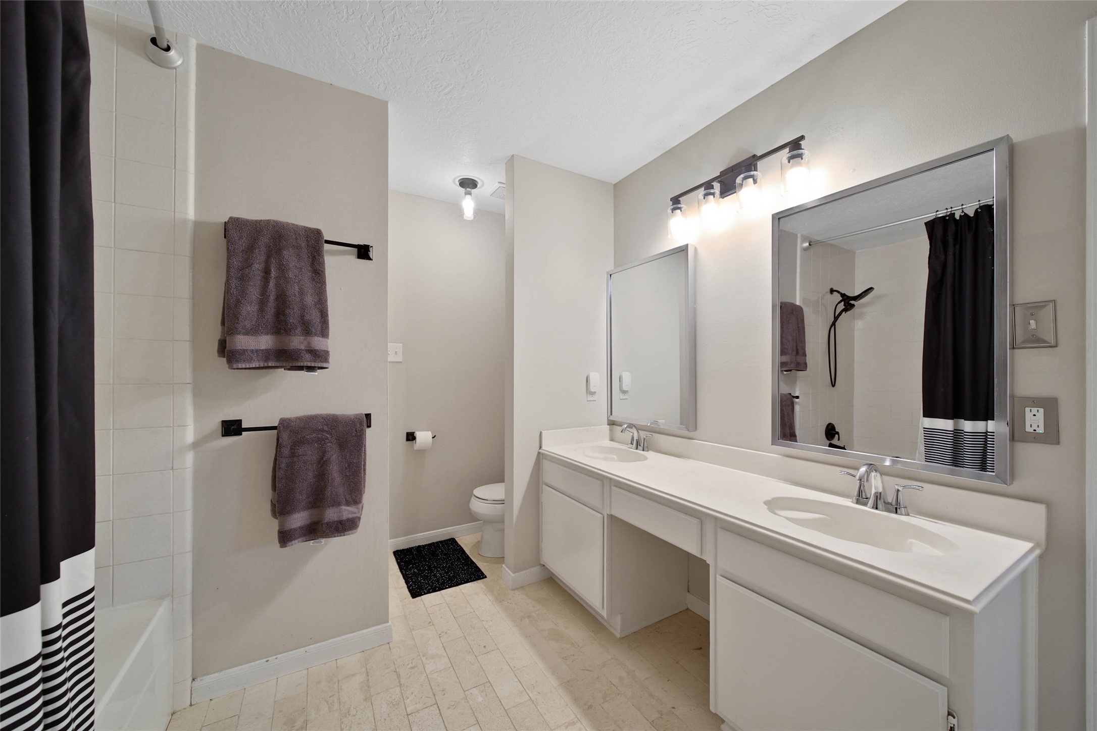 4843 Drew Forest Lane Humble, TX 77346 - Photo 14 of 21 Not only does this primary bathroom have double sinks, but it also has a wonderful vanity space.