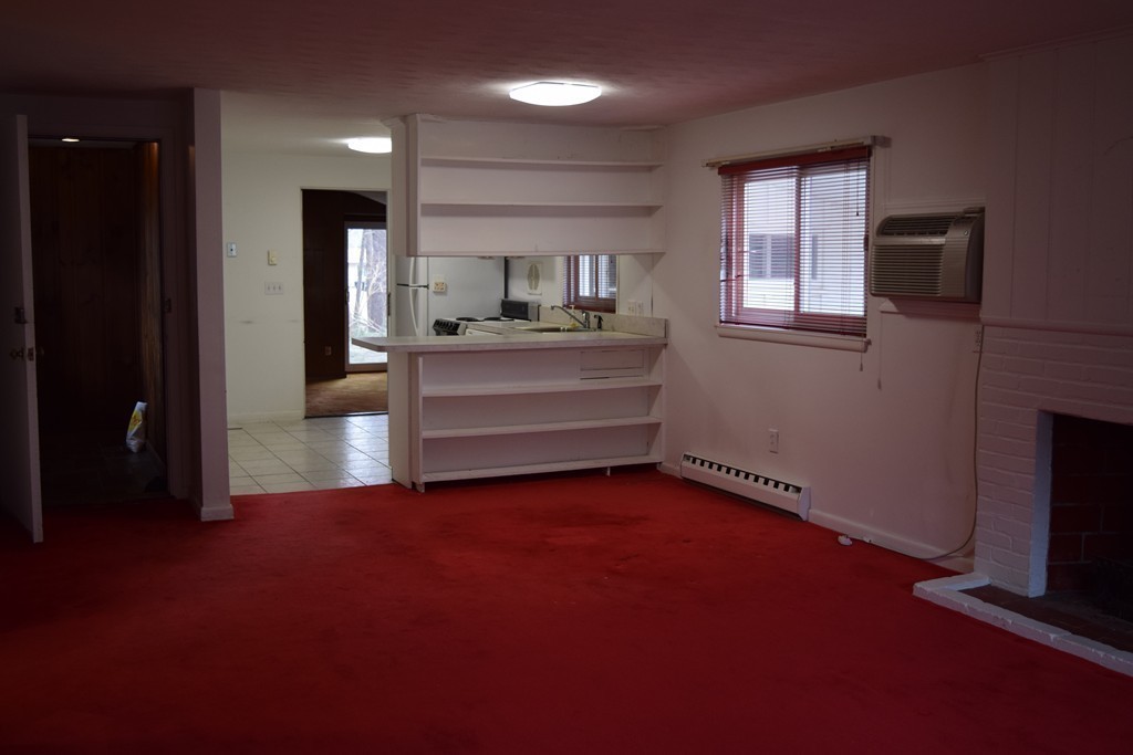2 Russell Road Wayland, MA 01778 - Photo 4 of 13 a view of room with window and fireplace