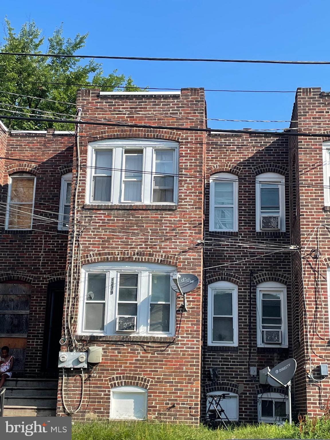 1279 South Merrimac Road Camden, NJ 08104 - Photo 1 of 1 a front view of a house with plants