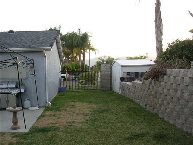 9416 Lake Canyon Road Santee, CA 92071 - Photo 13 of 15 Access to backyard through double wide gate.