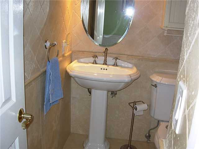 9416 Lake Canyon Road Santee, CA 92071 - Photo 7 of 15 Pedestal sink in upgraded hall bath.