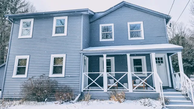 a front view of a house with windows