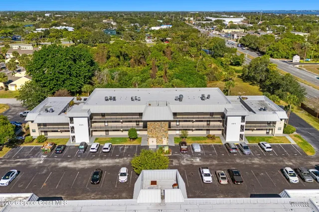 a view of swimming pool with outdoor seating and yard