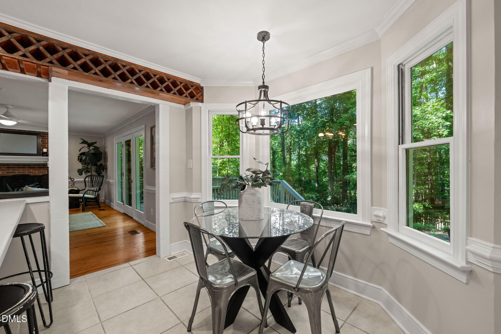 18 Strawberry Ridge Lane Durham, NC 27713 - Photo 15 of 59 a view of a dining room with furniture window and wooden floor