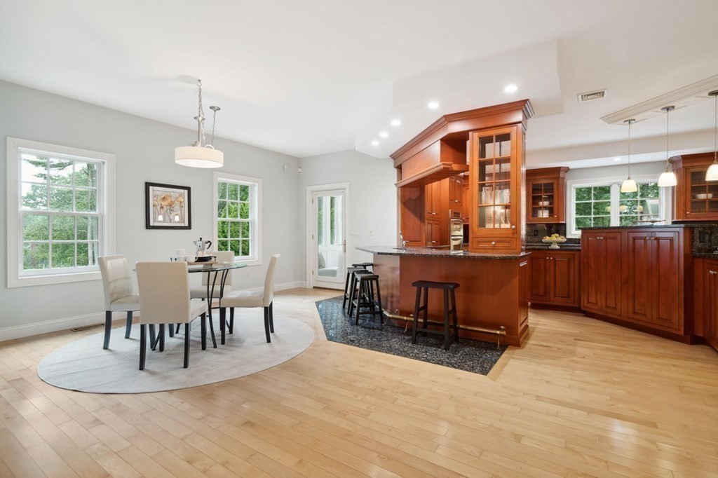 38 Pheasant Lane Manchester, NH 03109 - Photo 13 of 42 a dining room with furniture and window