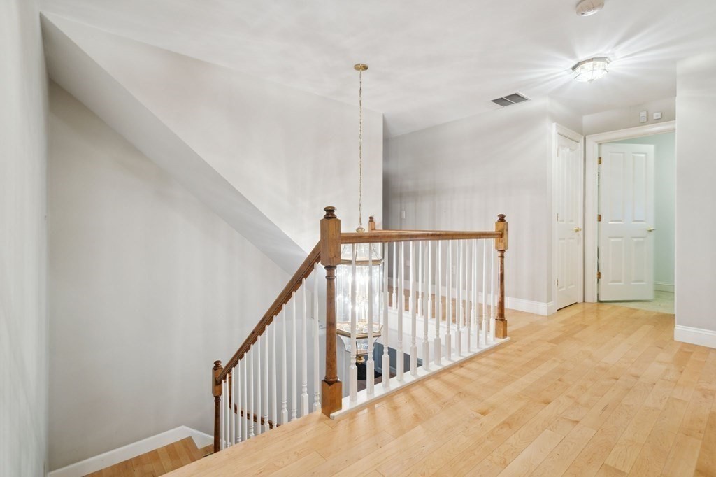 38 Pheasant Lane Manchester, NH 03109 - Photo 22 of 42 a view of a hallway view with staircase
