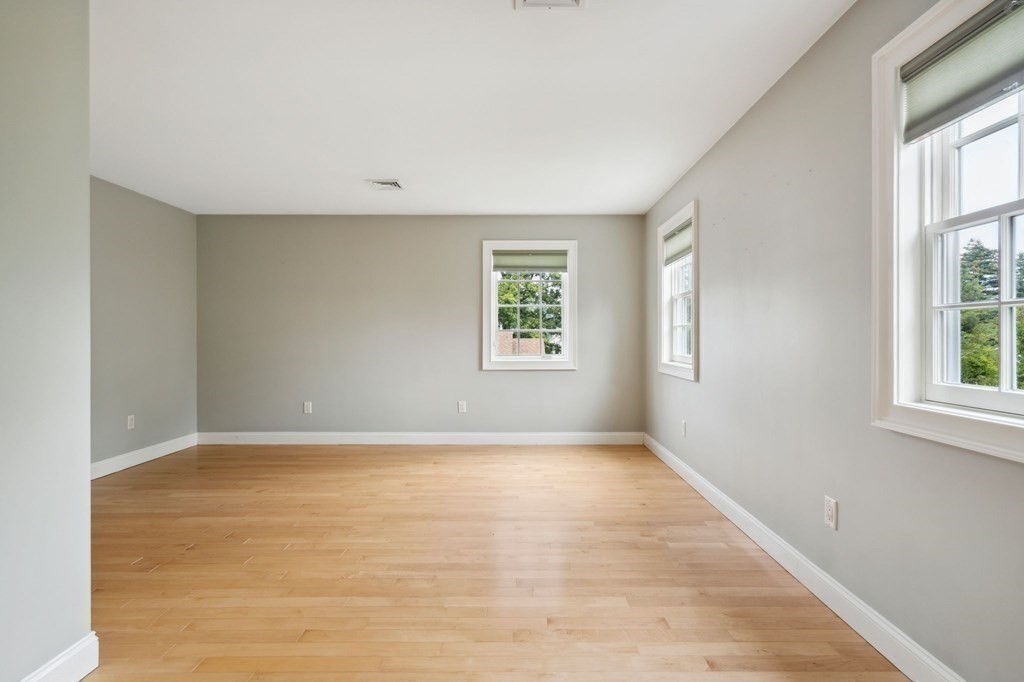 38 Pheasant Lane Manchester, NH 03109 - Photo 29 of 42 an empty room with windows