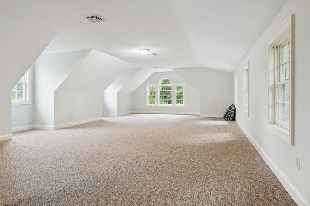 38 Pheasant Lane Manchester, NH 03109 - Photo 32 of 42 a view of an empty room with a window