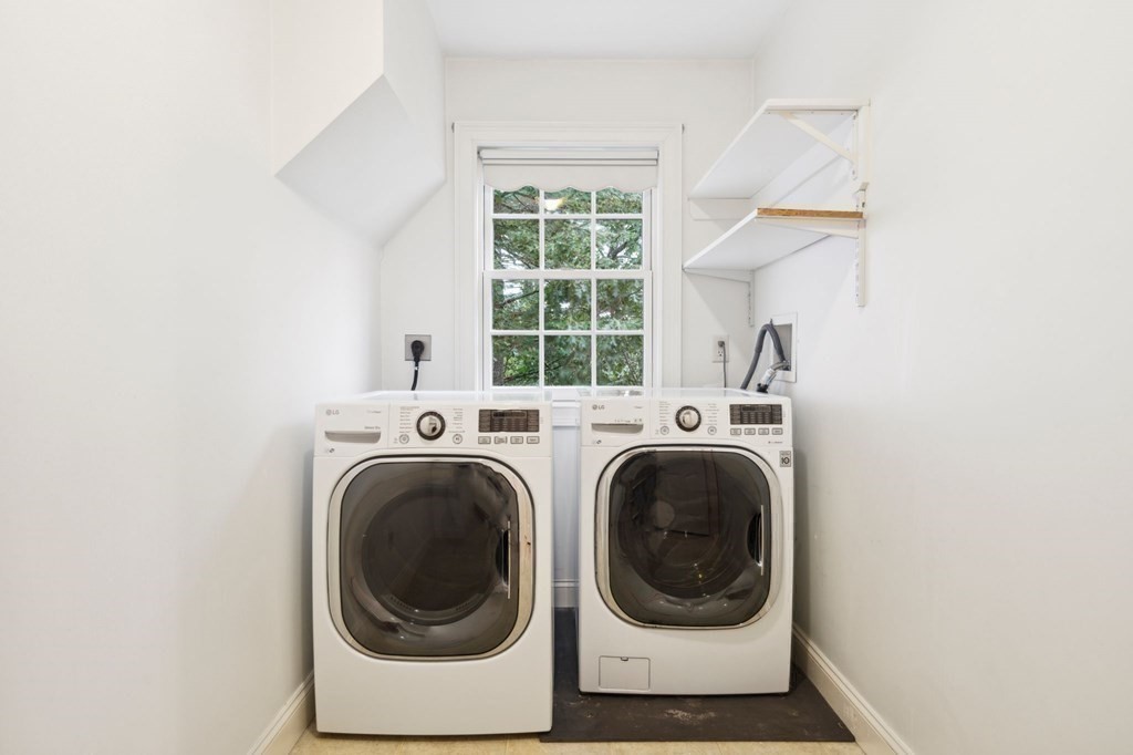 38 Pheasant Lane Manchester, NH 03109 - Photo 33 of 42 a utility room with dryer and washer