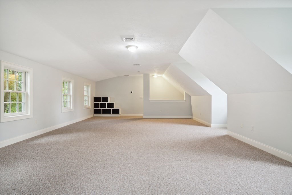 38 Pheasant Lane Manchester, NH 03109 - Photo 35 of 42 a view of empty room with a kitchen