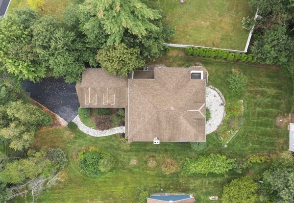 38 Pheasant Lane Manchester, NH 03109 - Photo 39 of 42 an aerial view of a house with a yard and lake view