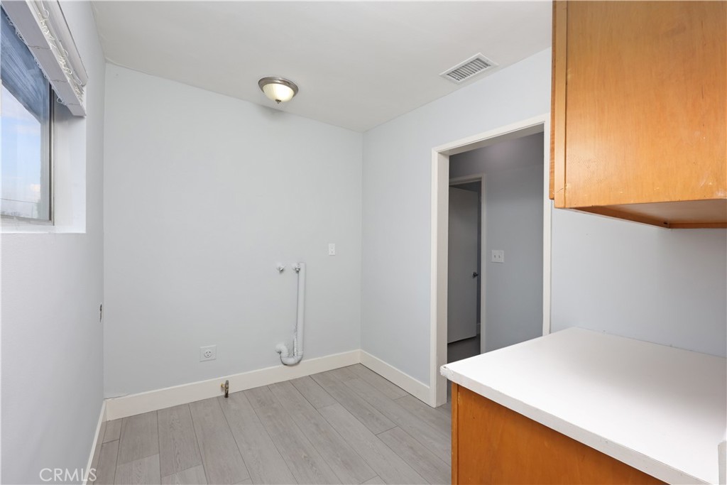7927 Brookmill Road Downey, CA 90241 - Photo 21 of 24 a view of a kitchen cabinets