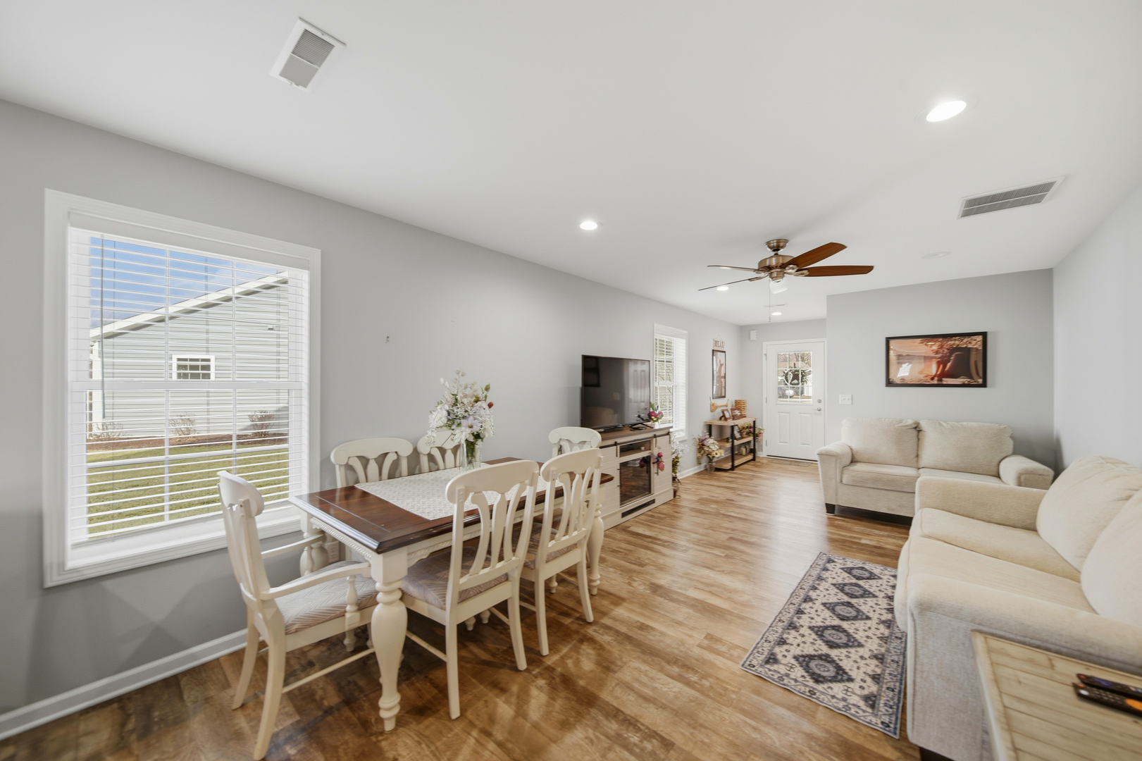 1525 Eadens Place Dixon, IL 61021 - Photo 11 of 30 a view of a dining room with furniture window and wooden floor