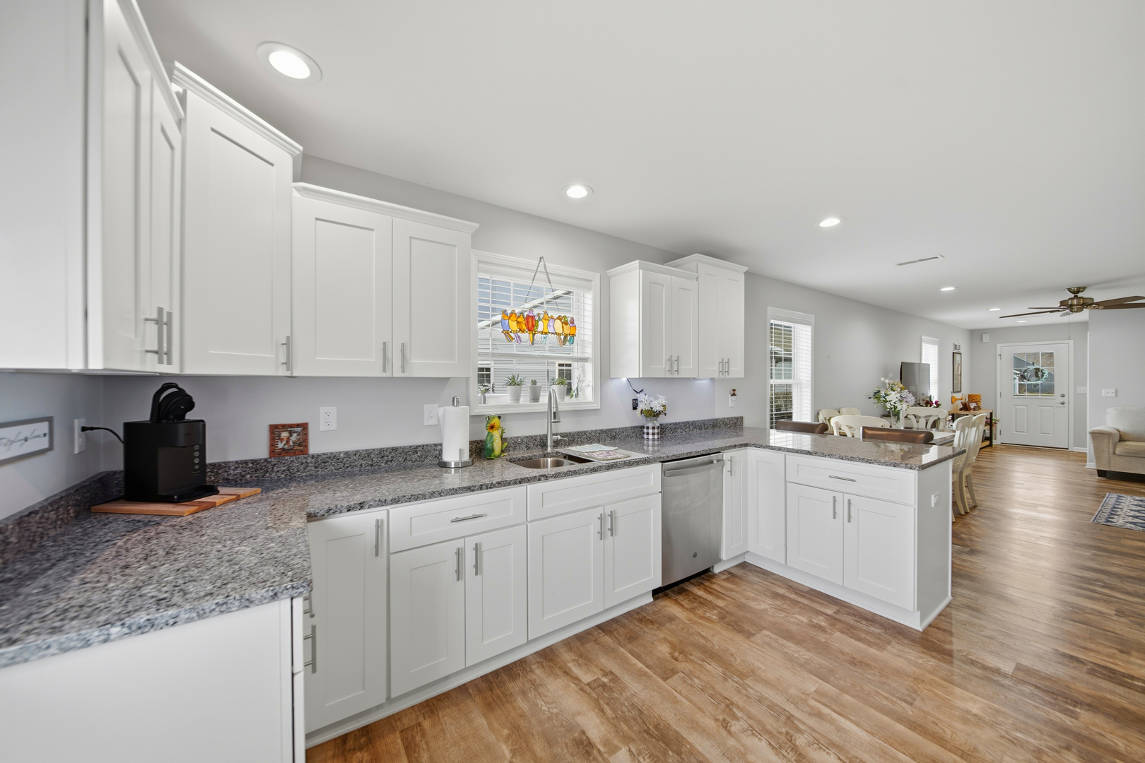 1525 Eadens Place Dixon, IL 61021 - Photo 16 of 30 a kitchen with sink cabinets and window