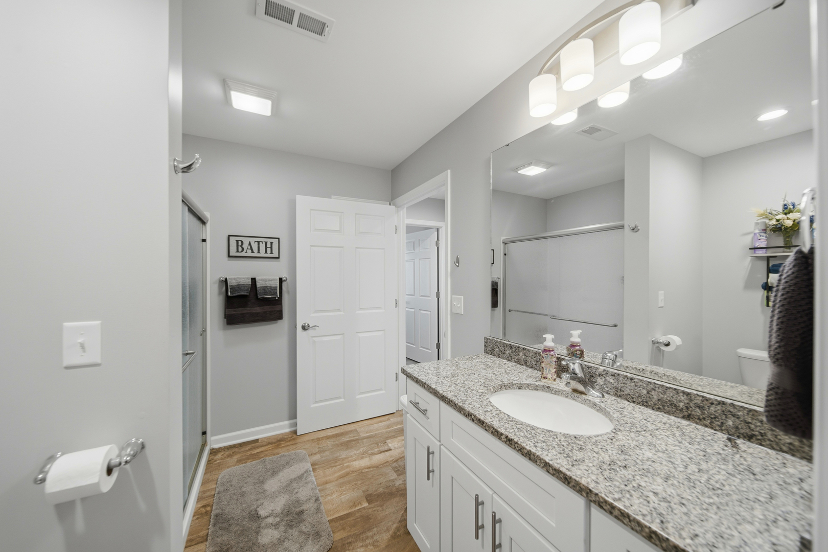 1525 Eadens Place Dixon, IL 61021 - Photo 22 of 30 a bathroom with a sink and a mirror
