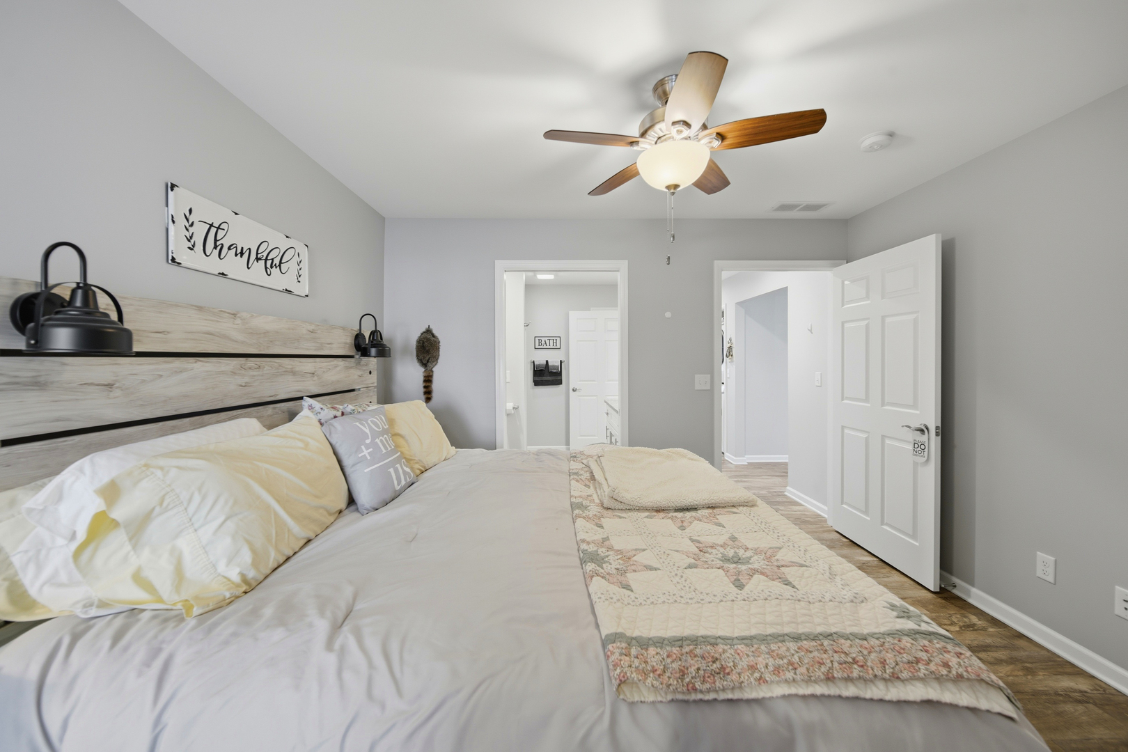 1525 Eadens Place Dixon, IL 61021 - Photo 26 of 30 a bedroom with a bed and ceiling fan