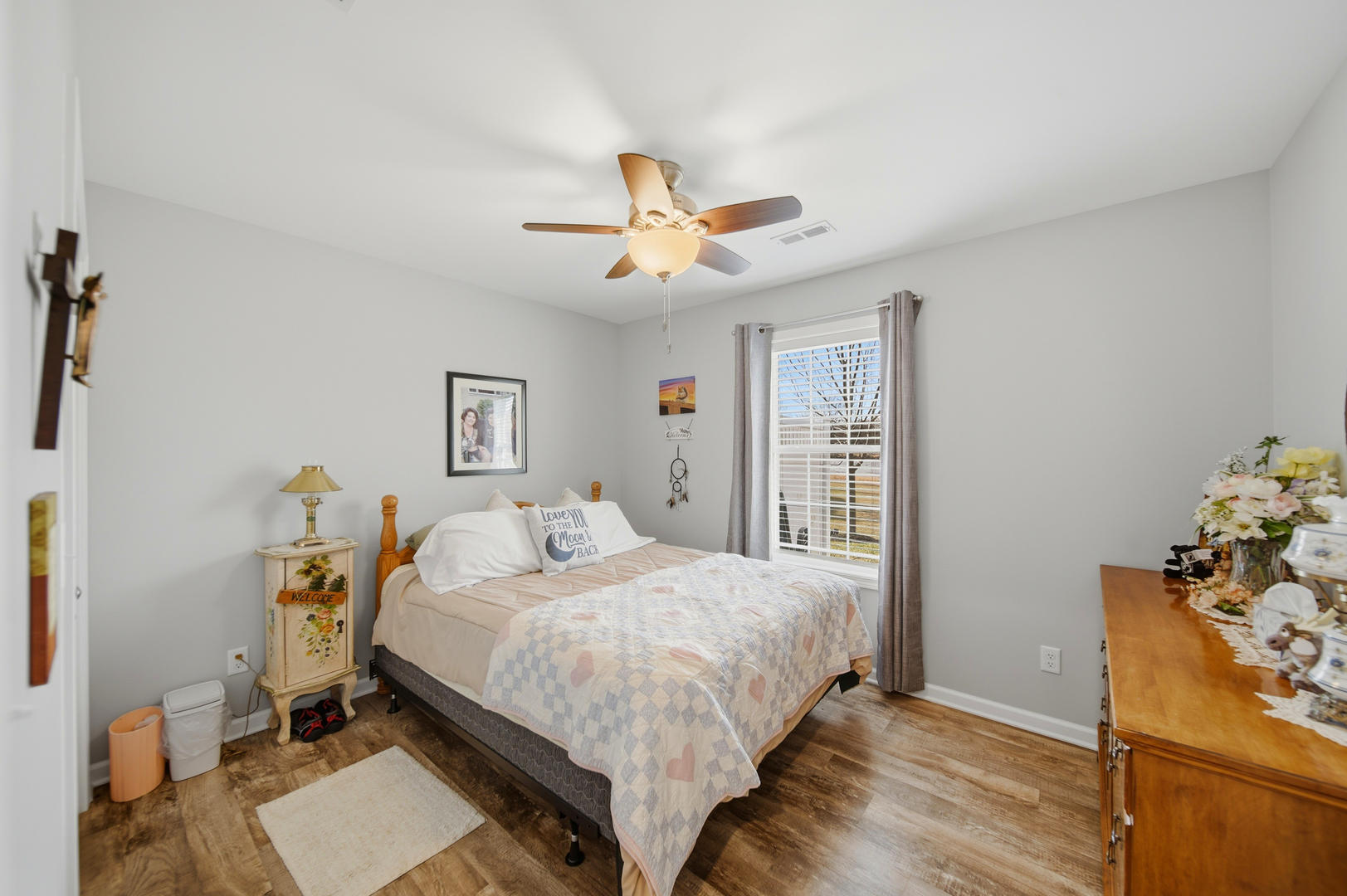 1525 Eadens Place Dixon, IL 61021 - Photo 27 of 30 a bedroom with a bed and a chandelier