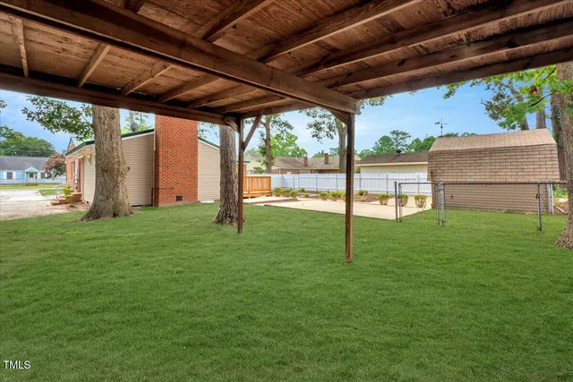 a view of a backyard with a garden