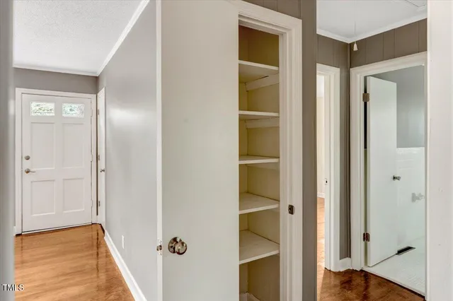 a view of a bathroom from the hallway