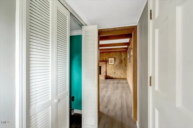 a view of a bathroom from a hallway