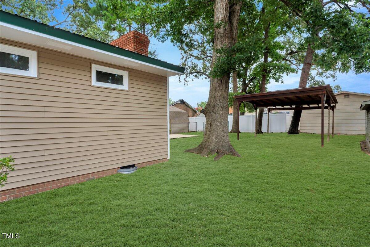 712 East 13th Street Roanoke Rapids, NC 27870 - Photo 6 of 46 a view of house with a backyard