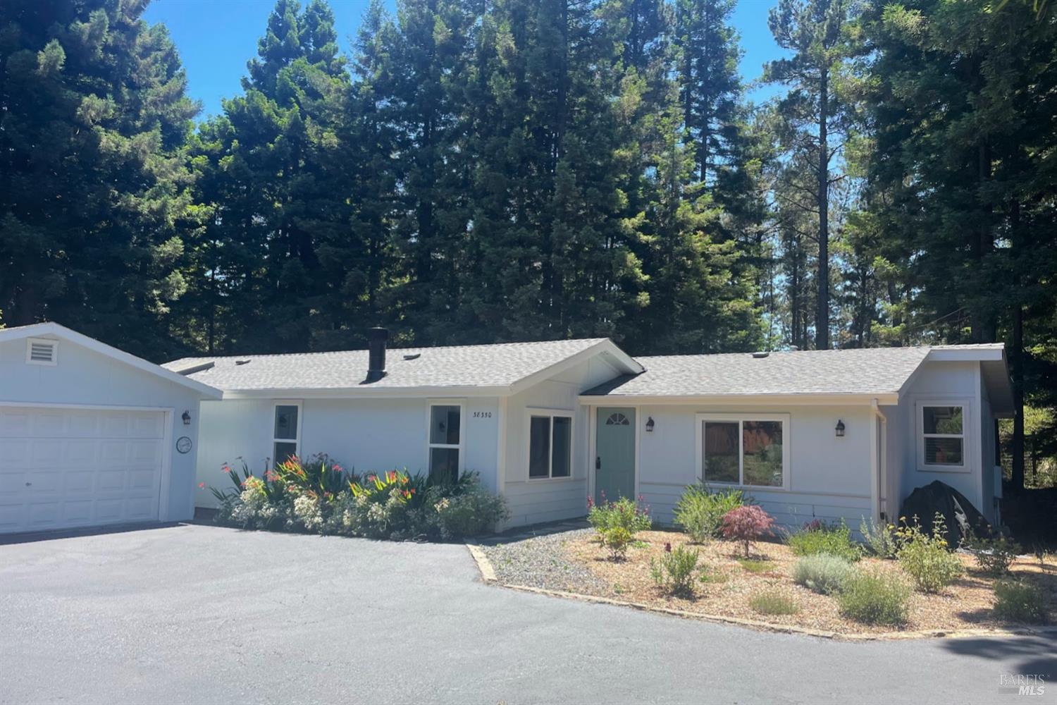 front view of a house with a yard