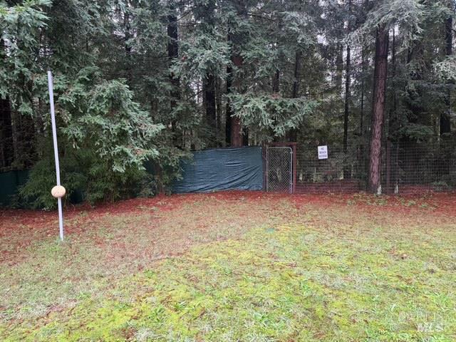 38350 Old Stage Road Gualala, CA 95445 - Photo 20 of 23 a backyard of a house with plants and outdoor space