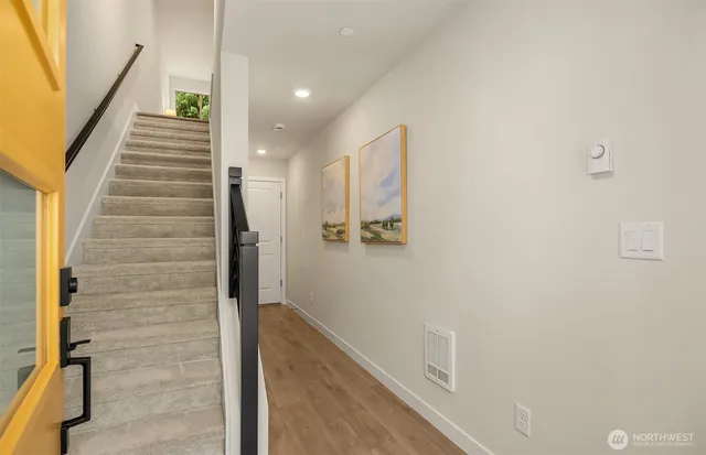 a view of hallway with stairs