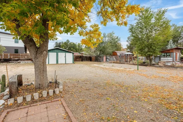a house with trees in front of it