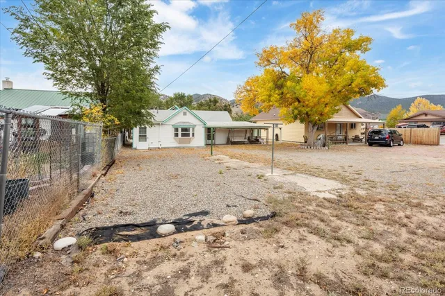 a view of a road with a building in the background