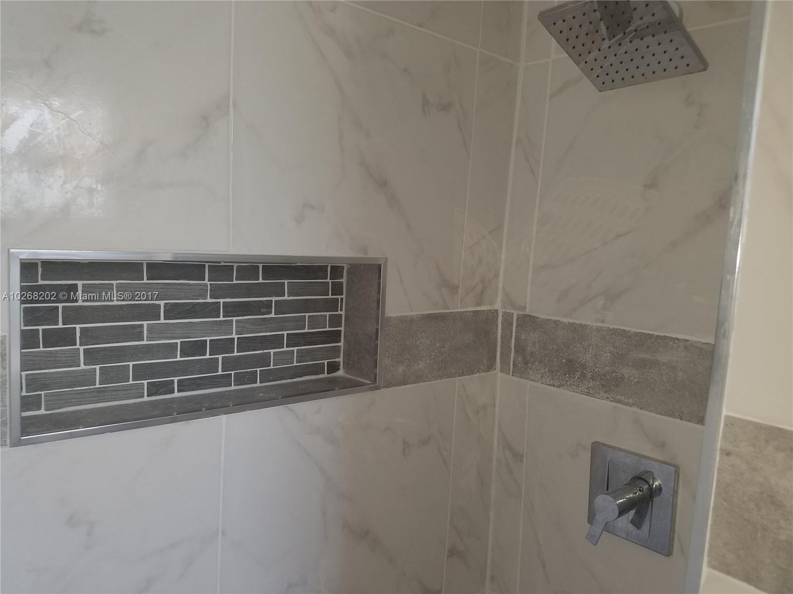 3091 Southwest 84th Court Miami, FL 33155 - Photo 13 of 24 a view of an empty room with a fireplace