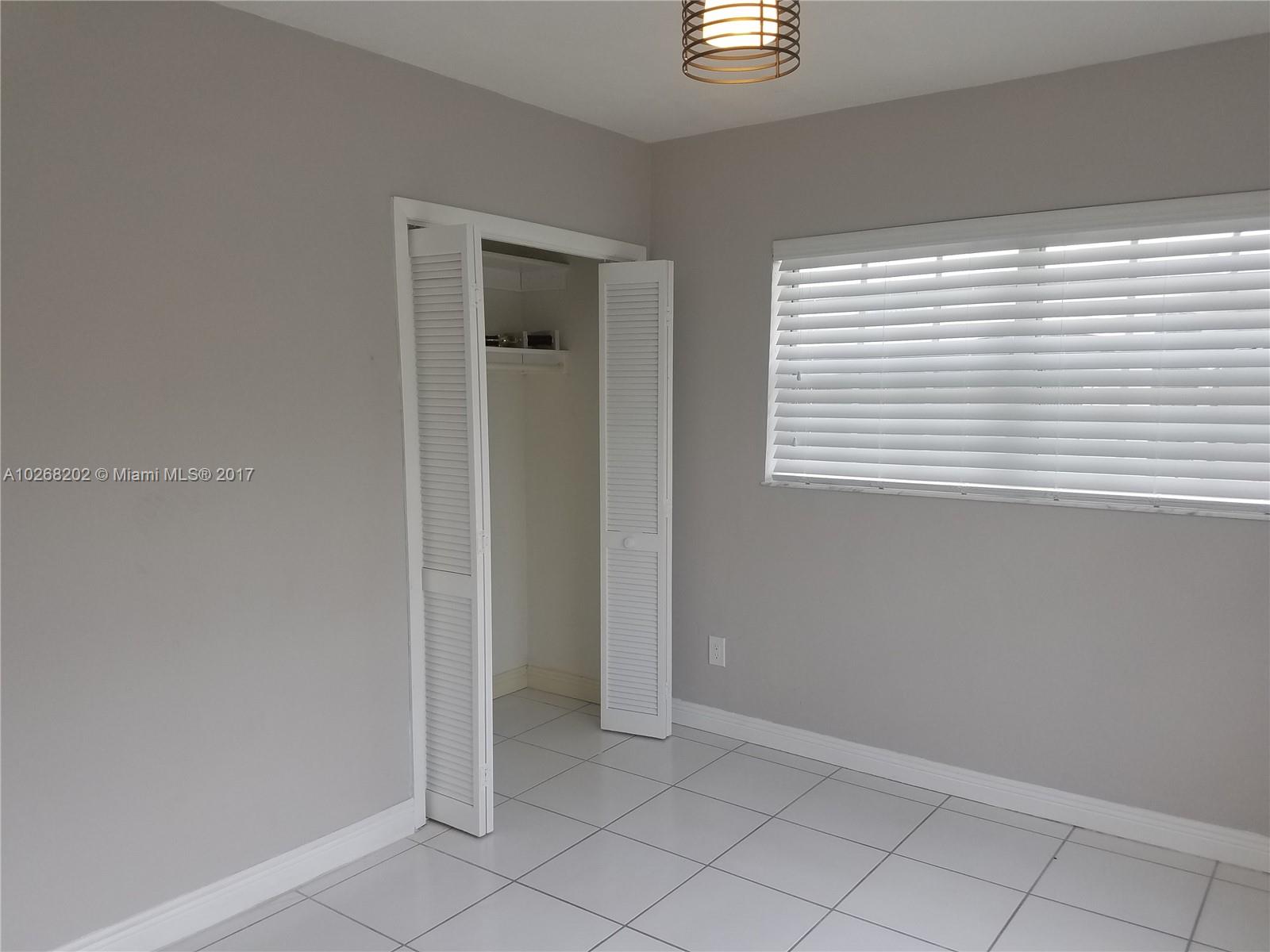 3091 Southwest 84th Court Miami, FL 33155 - Photo 19 of 24 a view of an empty room with window