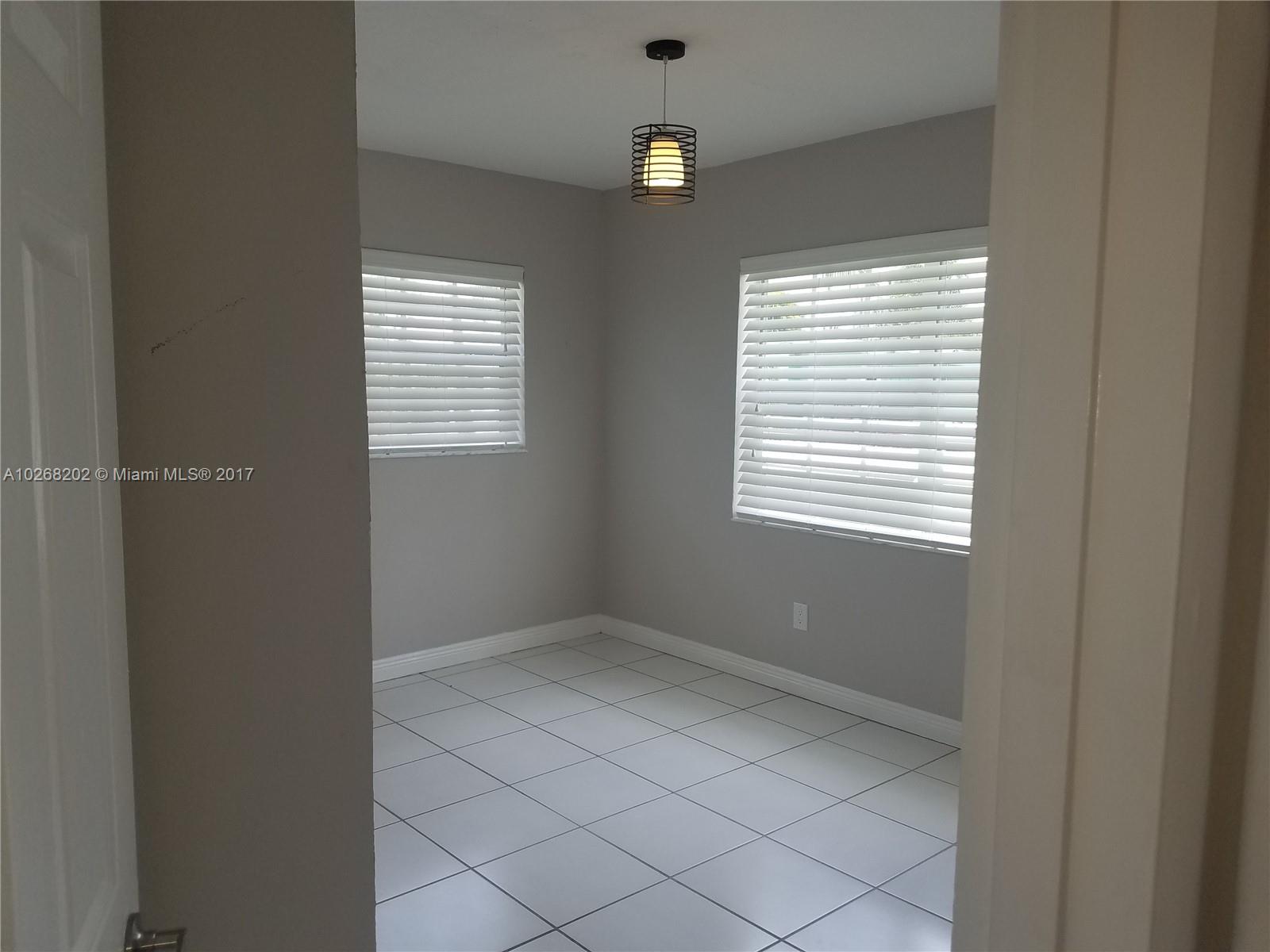 3091 Southwest 84th Court Miami, FL 33155 - Photo 20 of 24 a view of an empty room with a window
